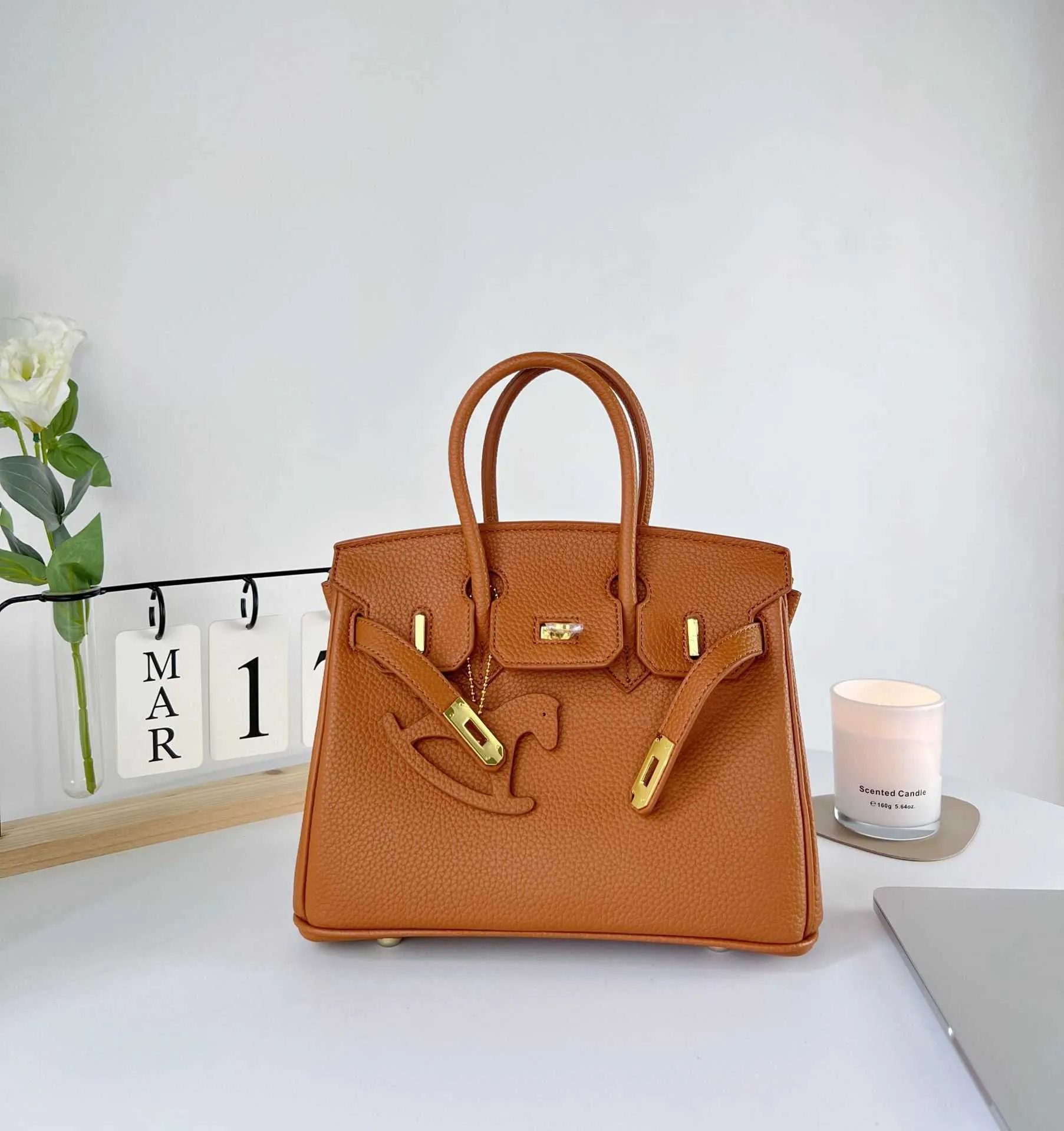 DHgate.com:Designer Litchi Pattern Genuine Leather Handheld