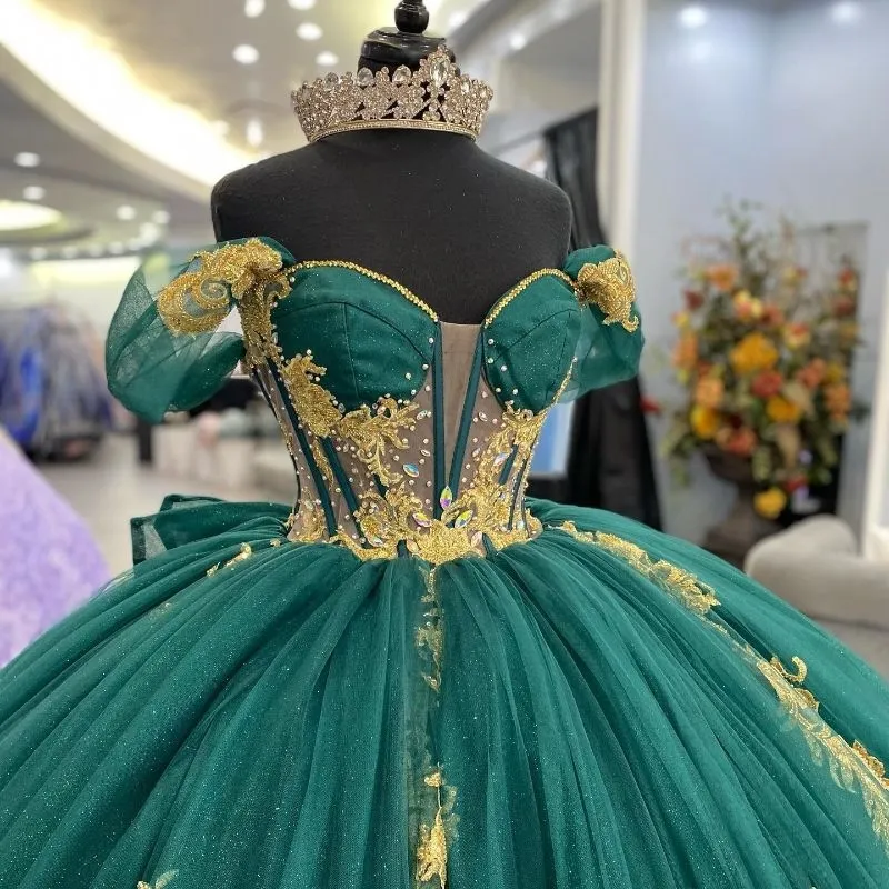 emerald green dress with a touch of gold Dreams Come True So Dress Your Love Story. We Invite You To Discover Your  Dream Dress. Your Best Day Ever Awaits. Book Your In-Store Appointment at  Debbie's Bridal Text Us 213-614-0740 Emerald