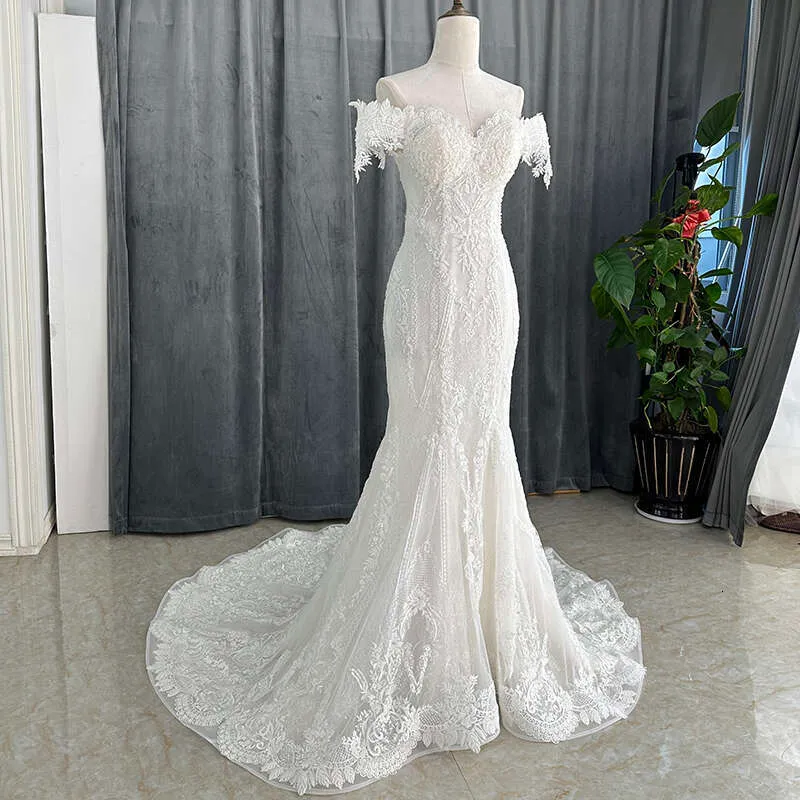 short sleeve beaded wedding dress Jovani S50581 Sheer Neck Short Sleeve Beaded Wedding Gown