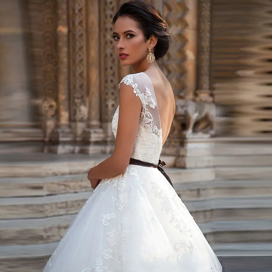 Illusion Top Wedding Gowns: A-Line Bridal Dress with Delicate Lace, Sexy  Backless Design & Black Sash Appliqus