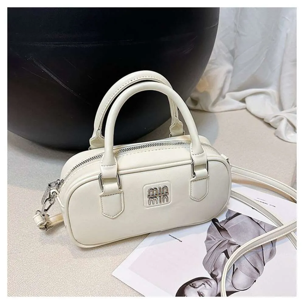 Sac a main de marque de mode en gros transfrontalier pour sac a bandouliere pour femme Style de printemps sac a main a bandouliere unique a la mode et