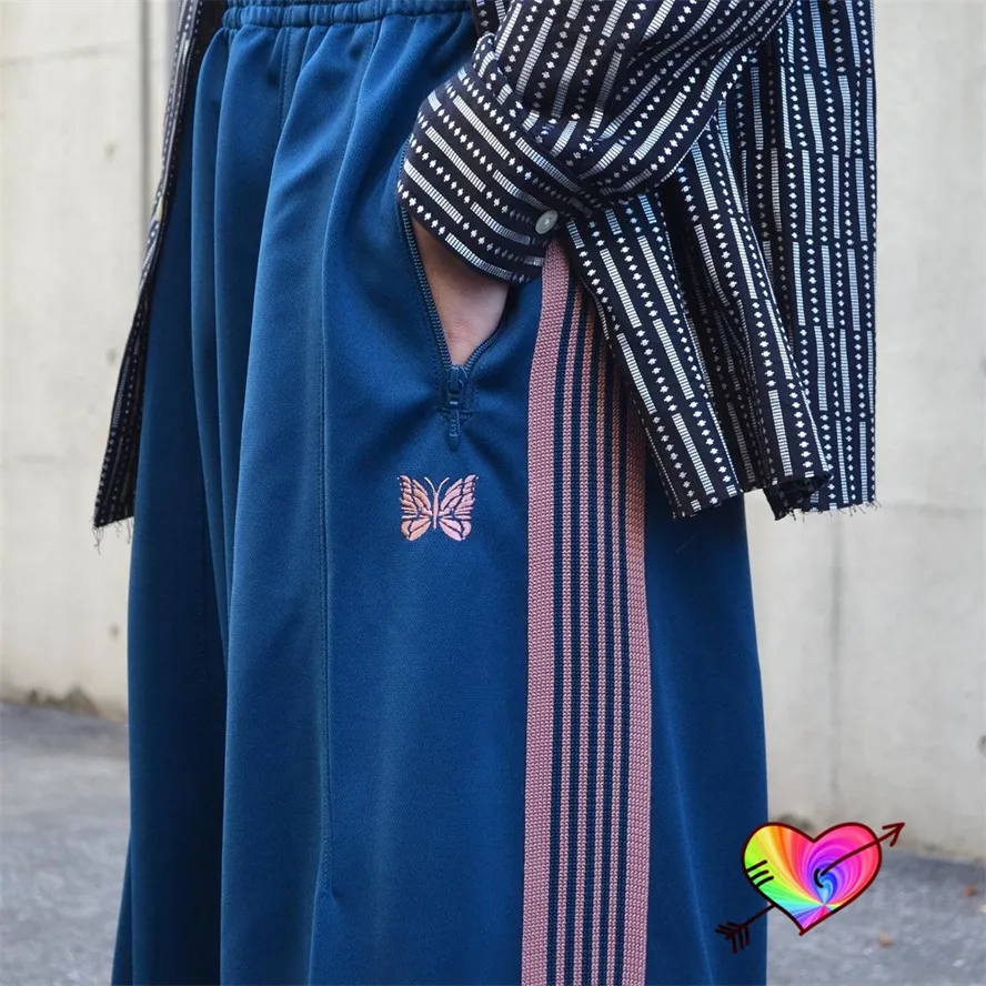 Pink Butterfly Stripe Needle Track baggy pants - 2023 Men& Pink Butterfly Stripe Needle Track baggy pants - 2023 Men&
