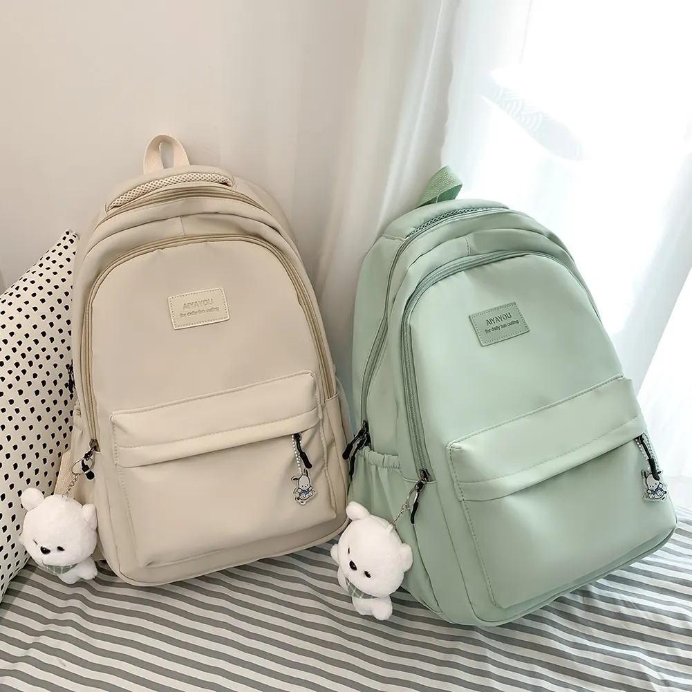 DHgate.com:Large Nylon School Backpack with Cute Pendant for