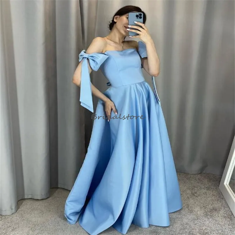 strapless open back dress Sparkly Blue Spaghetti Straps Homecoming Dresses MH560