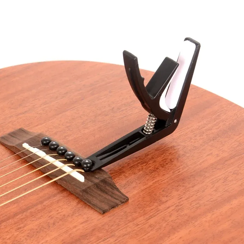Wholesale Universal Zip Lock Plastic Capo Clip For Acoustic Guitars Woodworking And Ukuleles From Homepro17 3.89 DHgate.Com
