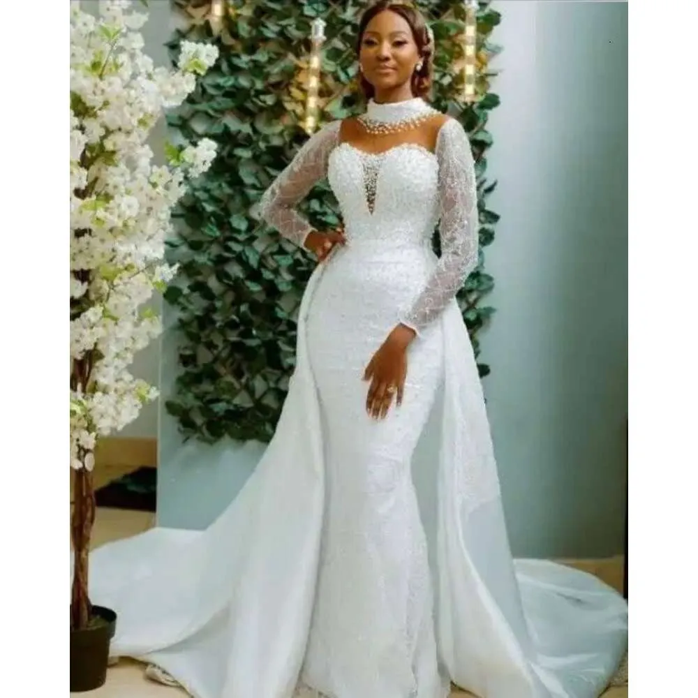 Fishtail long sleeve wedding dress 2025