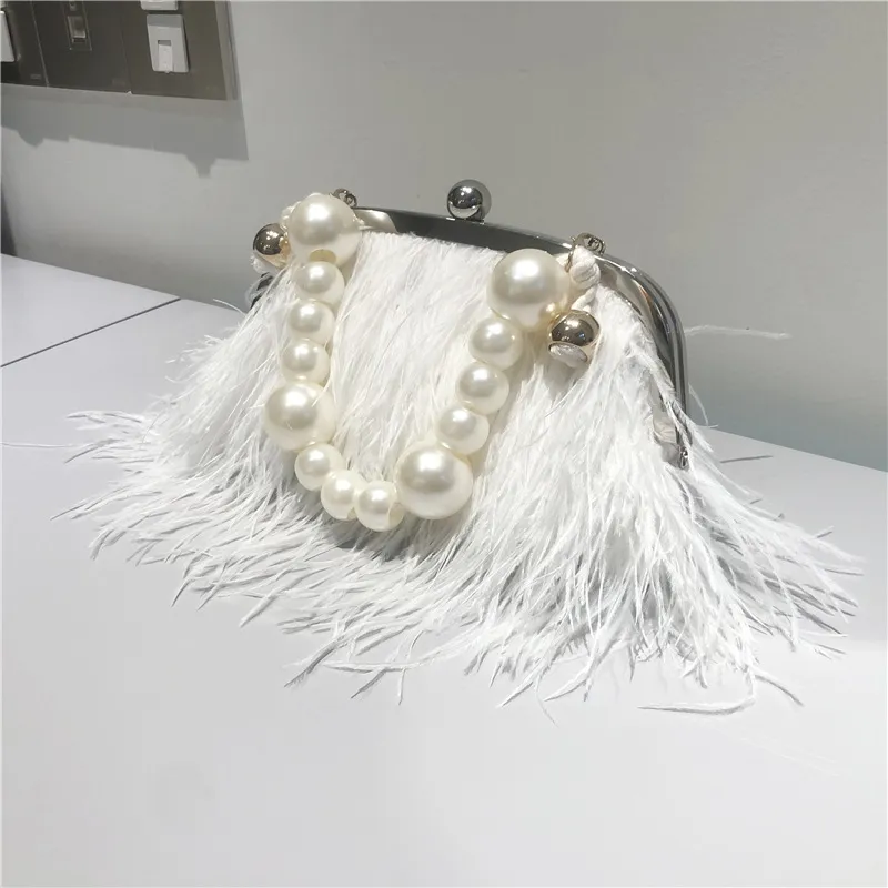 White feather clutch on sale