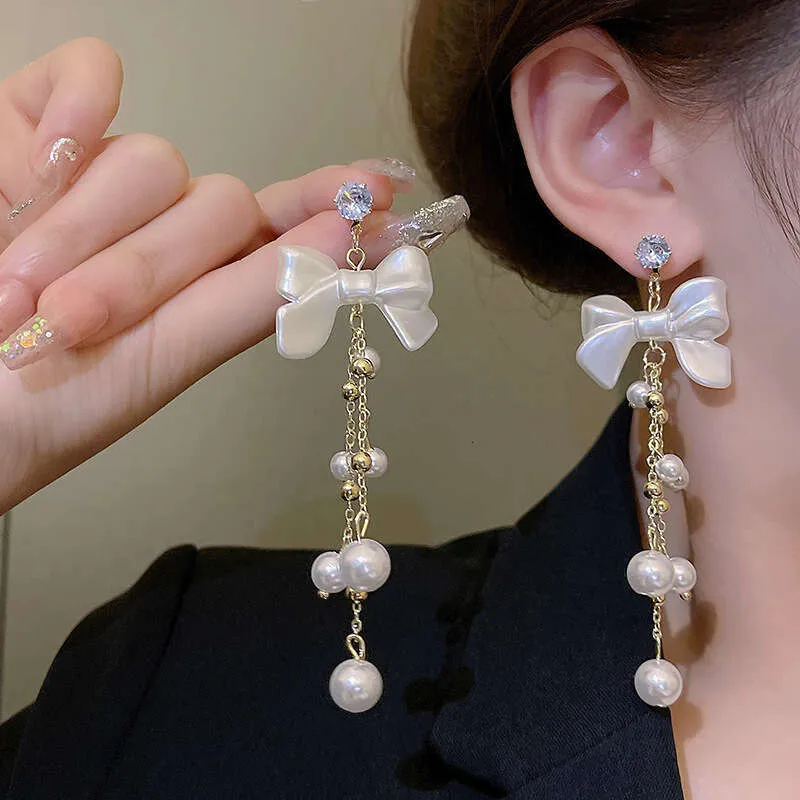 thumbnail image 2 of Bow Earrings Dangle Gold Bow Earrings For Women Bow Tassel Chain Earrings Ribbon Bow Dangle Earrings Bowknot Long Earrings Gold Silver Statement Earrings ( Gold Bow Dangle Earrings Gold 2 of 11