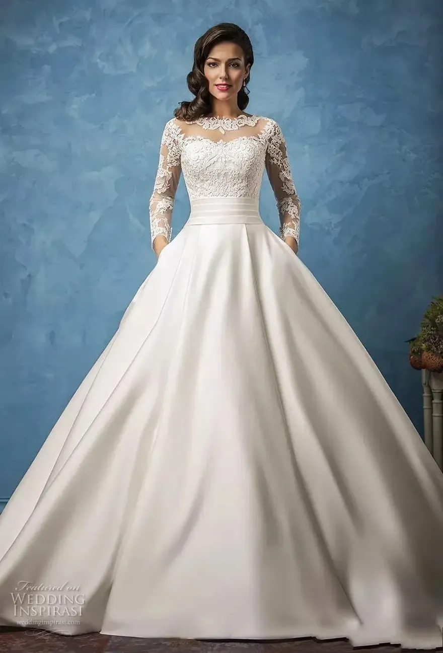Amelia Sposa Lace Long Sleeve Wedding Dresses with Pockets - Long Sleeves, Jewel Neckline, A-Line Silhouette, Backless Design, Sweep Train, Satin