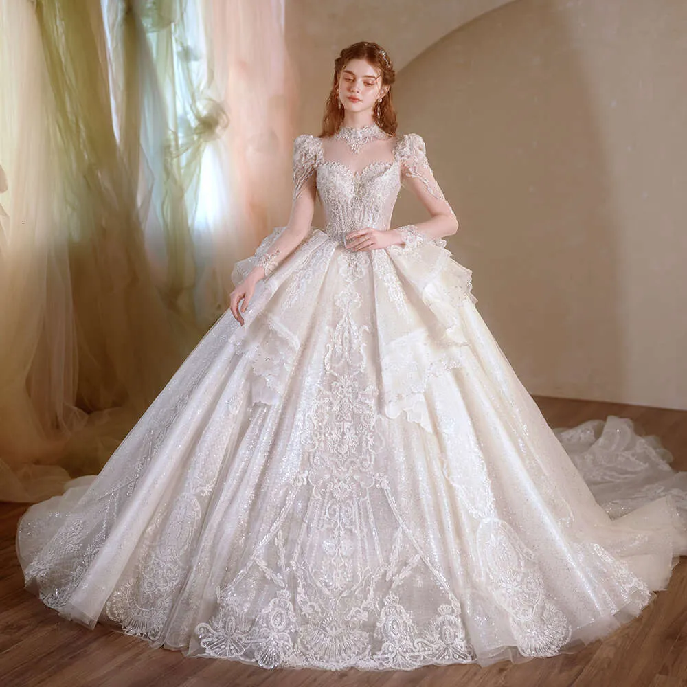 Jancember bespoke bridal dress - High Neck, Full Sleeves, Illusion Embroidery, Ruffles - First-Rate (2024) Jancember bespoke bridal dress - High Neck, Full Sleeves, Illusion Embroidery, Ruffles - First-Rate (2024)