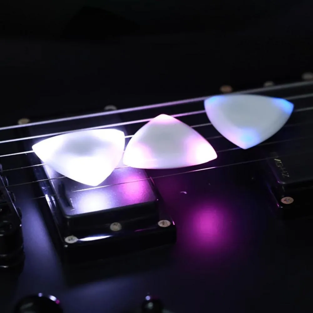 DHgate.com:Glowing LED Guitar Pick: Portable Luminous Light