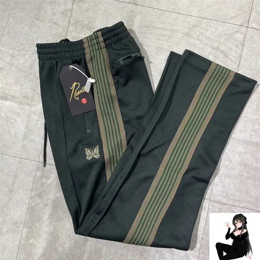 Y2K BOOT-CUT Poly Smooth Needles ladies track pants with Y2K BOOT-CUT Poly Smooth Needles ladies track pants with