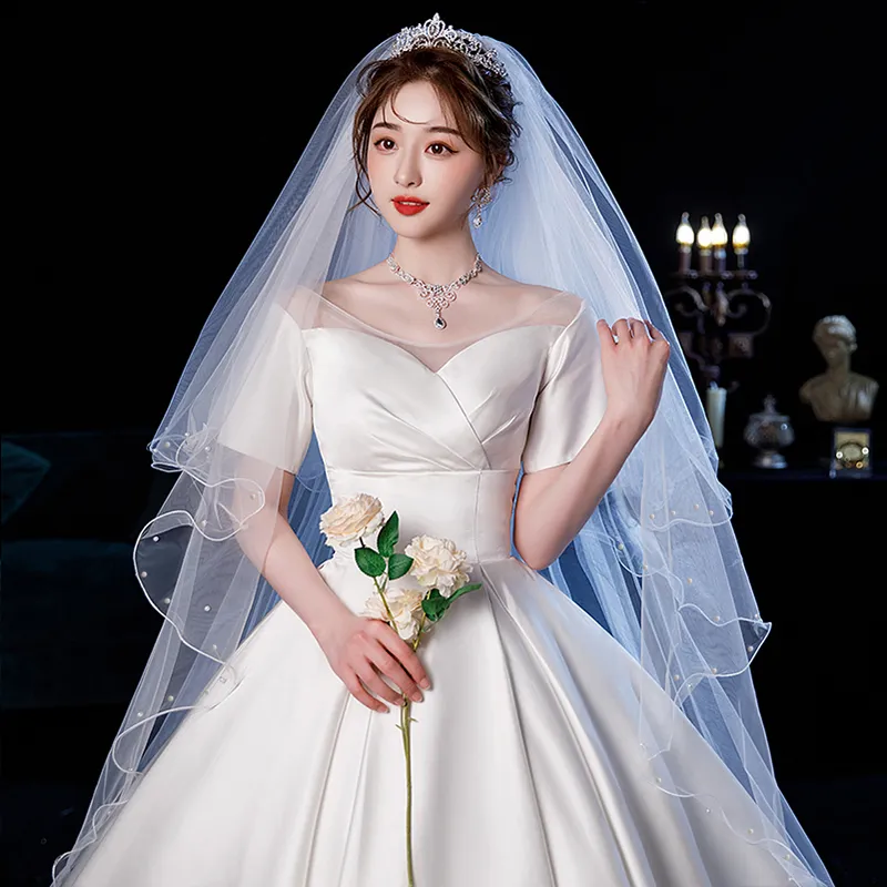 Stunning Two-Layer Pearls Bridal veil in wedding with Comb
