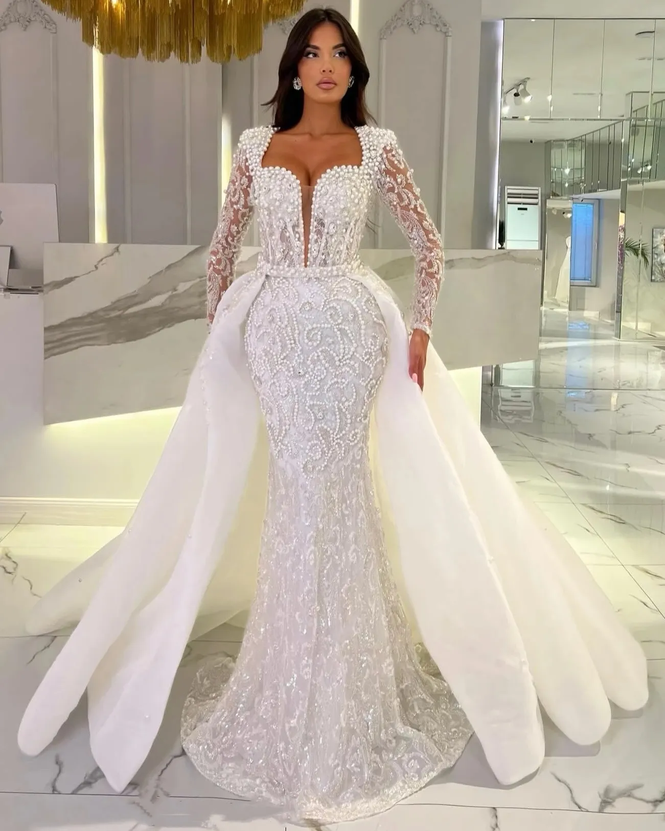 Custom-Made Bling Mermaid Wedding Gowns with Pearls, Sequins, V-Neck, Overskirt, and Crystal Long Sleeves - Elegant Bridal Gown