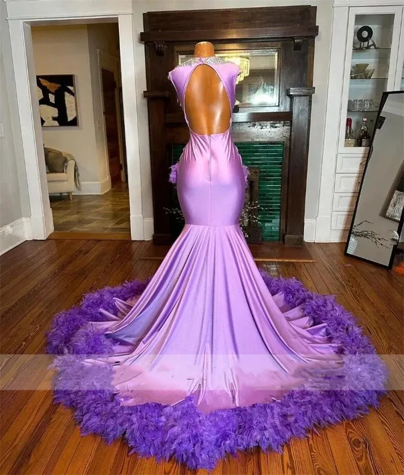 Sparkling Purple Purple mermaid prom dress with Shiny Beads, Crystal Rhinestones, and Feathers - Perfect for Birthday Parties and Evening Events Sparkling Purple Purple mermaid prom dress with Shiny Beads, Crystal Rhinestones, and Feathers - Perfect for Birthday Parties and Evening Events