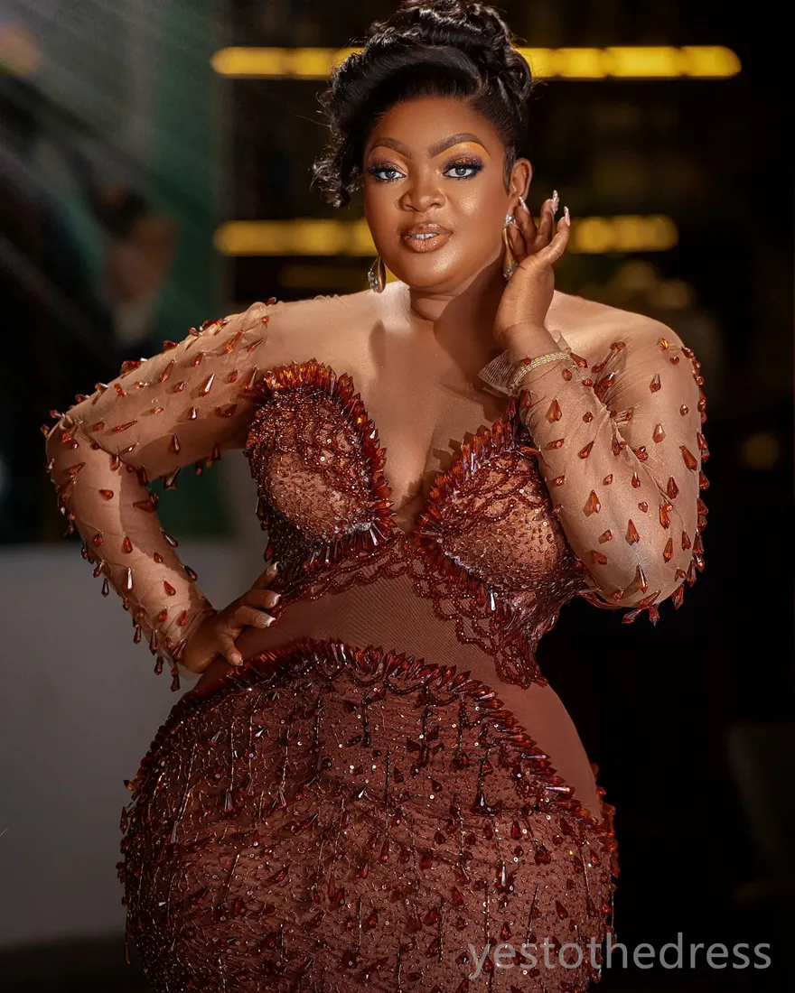 Plus Size Black Aso Ebi sparkly mermaid prom dress with Sheer Neckline, Crystals, Beading, and Tassel - 2022 Collection