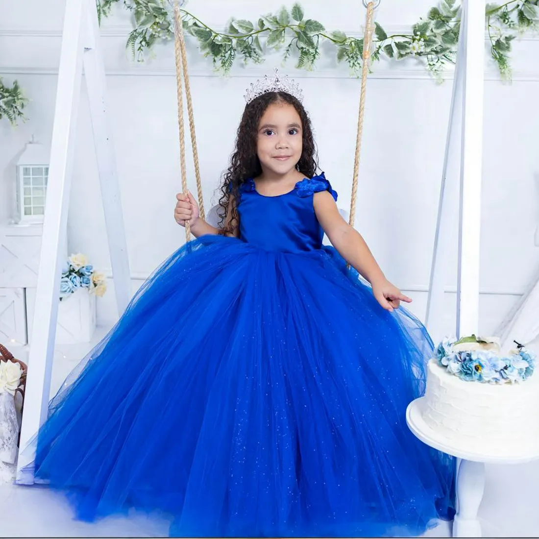Shimmering Royal Blue communion dress with train with Sheer Neckline, Puffy Pleated Skirt, Tiered Tulle Ball, Appliqued Lace and Beading - Perfect for