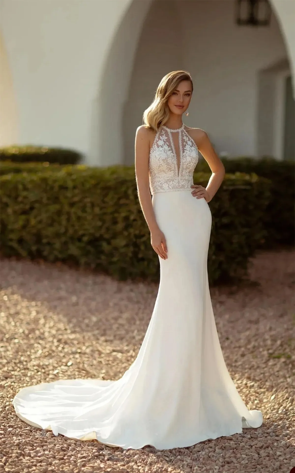 Custom-made Halter mermaid Halter wedding Gown with Appliques and Illusion Detailing - Sleeveless Bridal Gown for a Simple and Elegant Look Custom-made Halter mermaid Halter wedding Gown with Appliques and Illusion Detailing - Sleeveless Bridal Gown for a Simple and Elegant Look