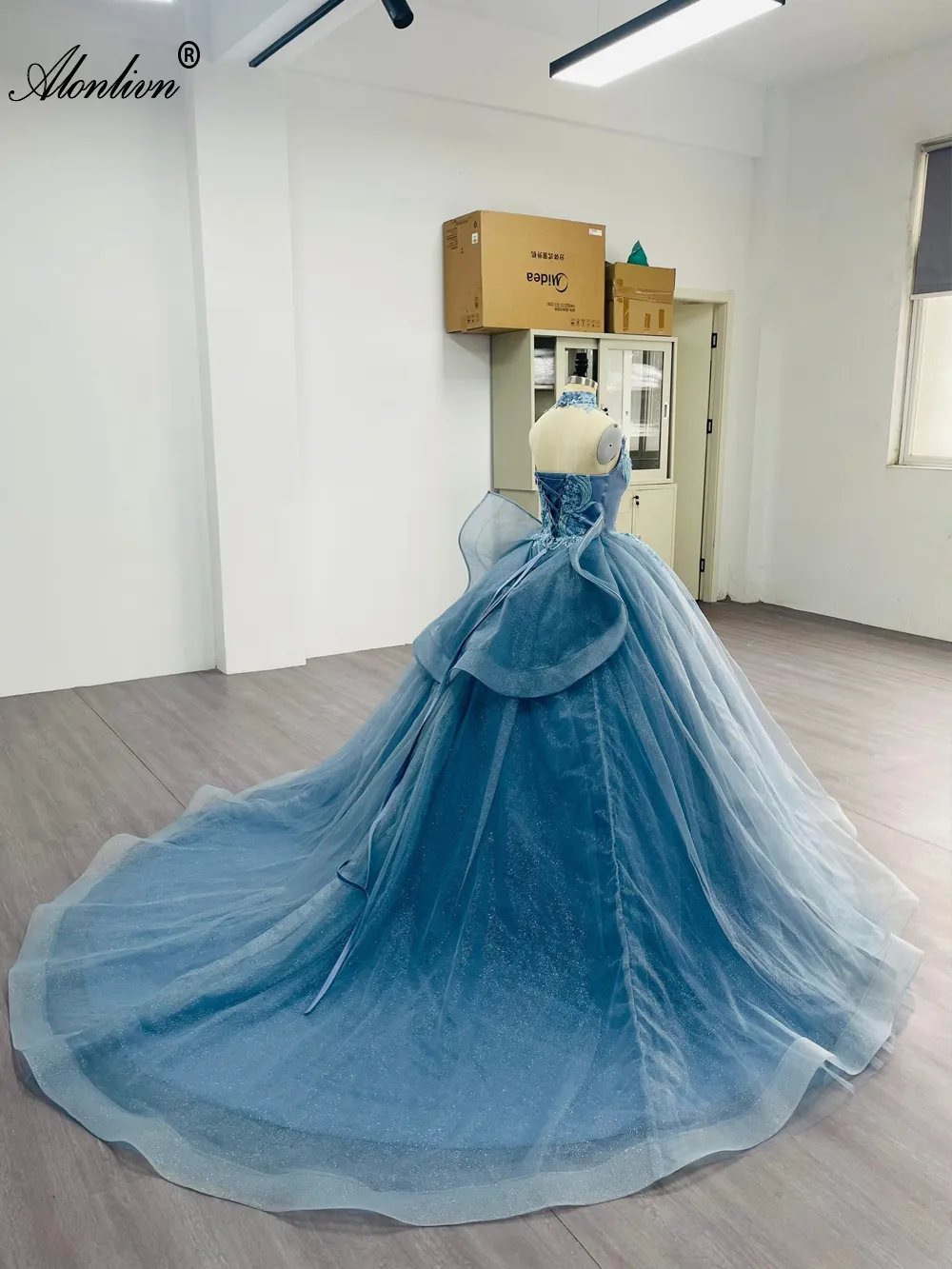 Stunning Off-Shoulder Tulle blue ballgown wedding dress with Beaded Embroidery, Lace, and Bow by Lonlivn