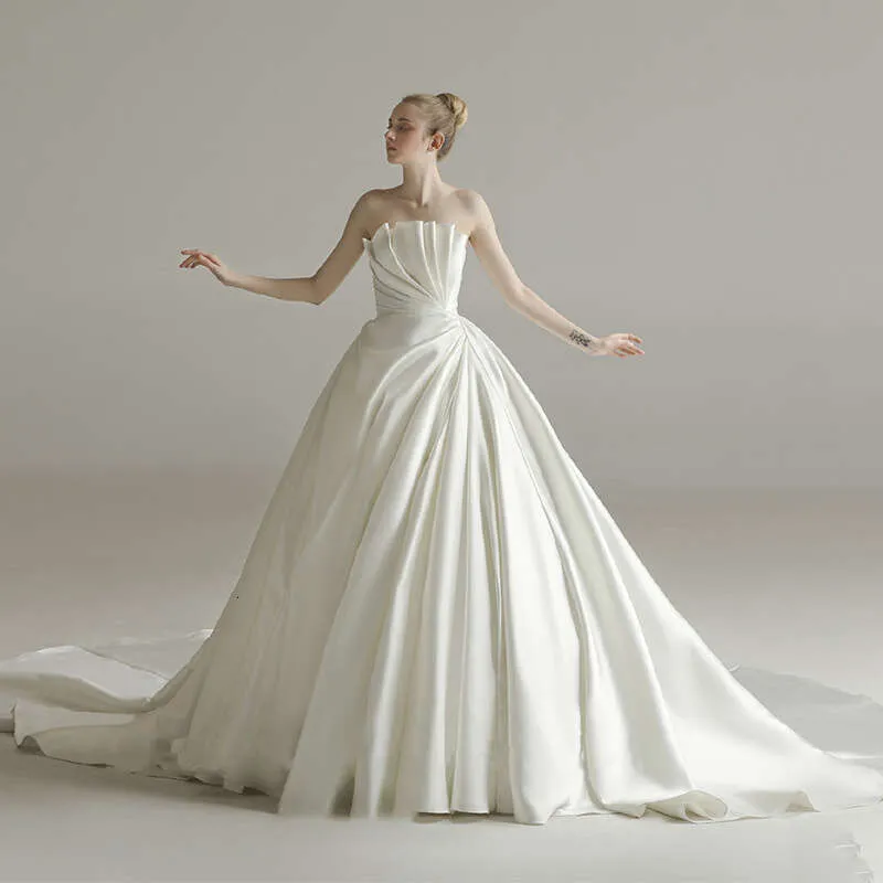 Elegant Strapless Satin Wedding Dress for A-Line Brides Elegant Strapless Satin Wedding Dress for A-Line Brides