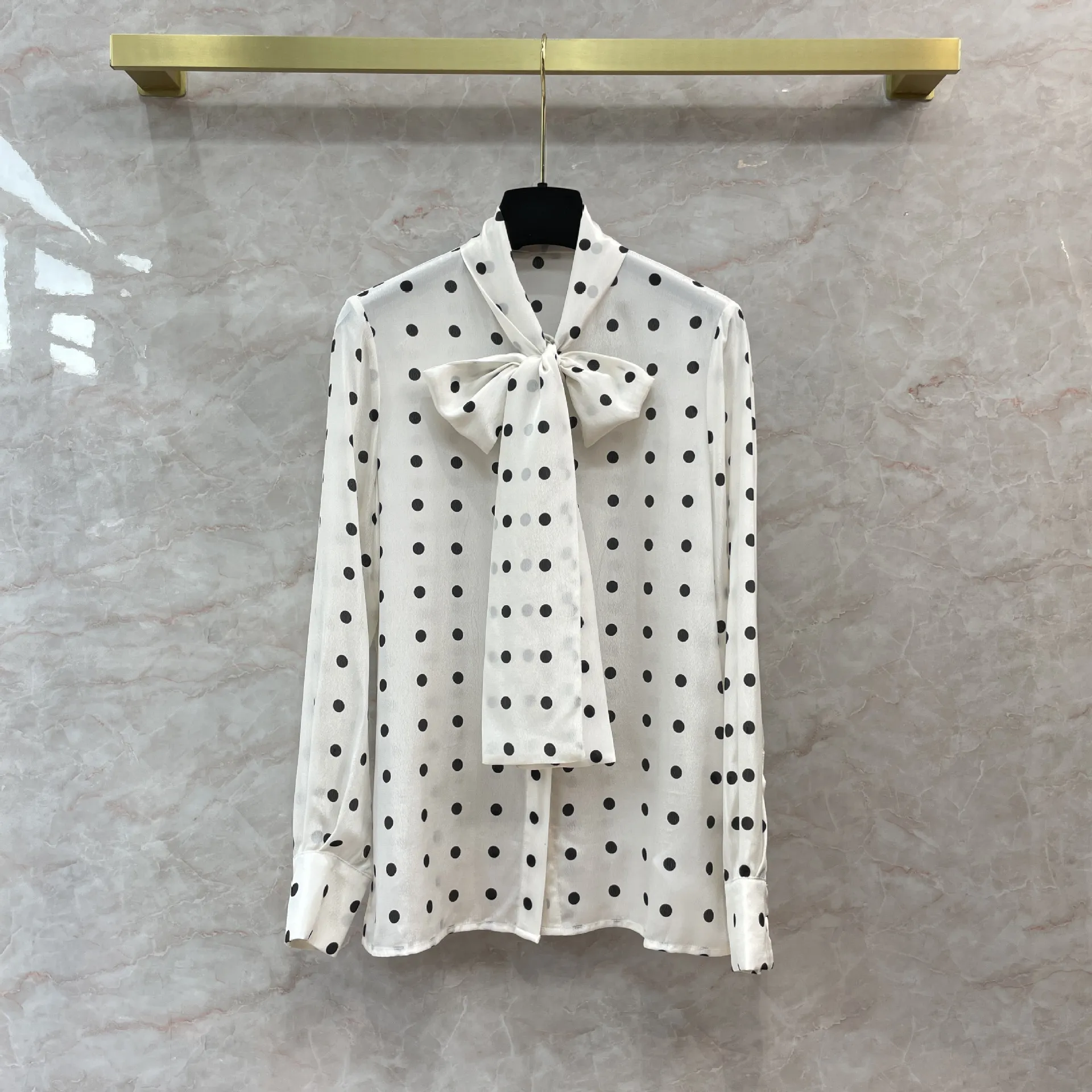 blue spotted blouse