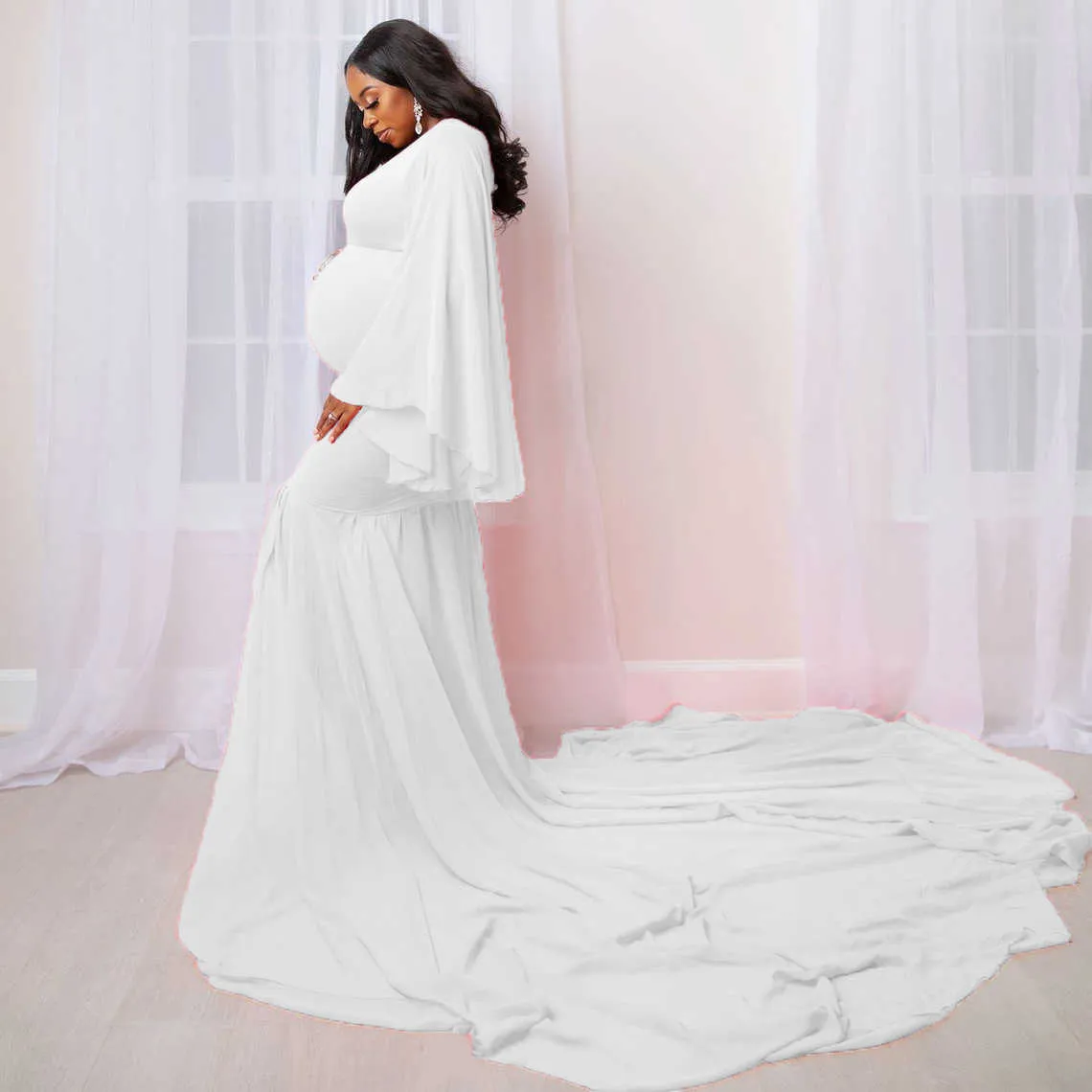 10 Winter Maternity Dresses You Need For An Amazing Photo Shoot |  iHeartPregnancy