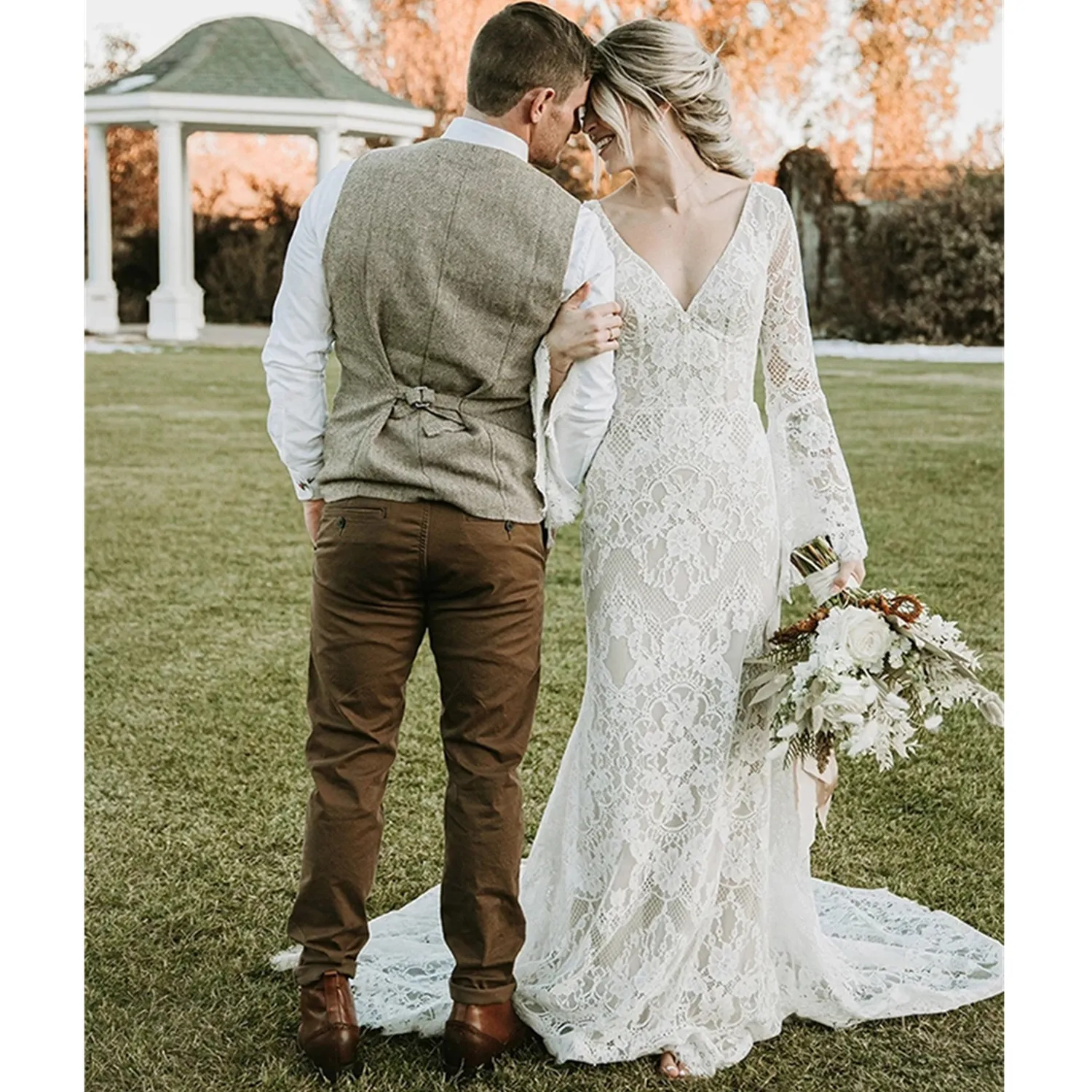 Custom-made Vintage Lace Mermaid Boho Lace wedding dress with Long Sleeves, V-Neck, and Open Back - Rustic Boho Bridal Gown with Court Train
