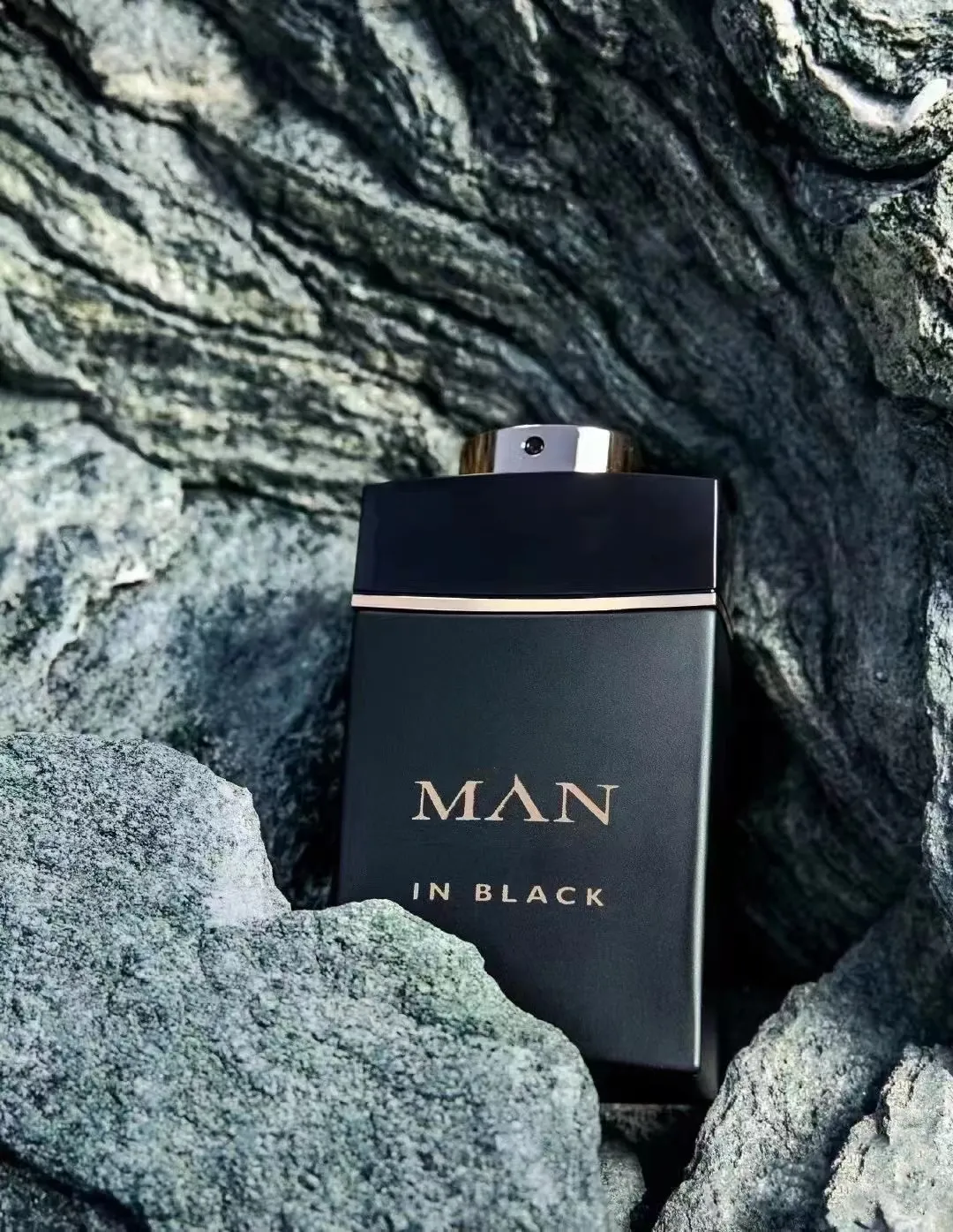 Man in deals black aftershave