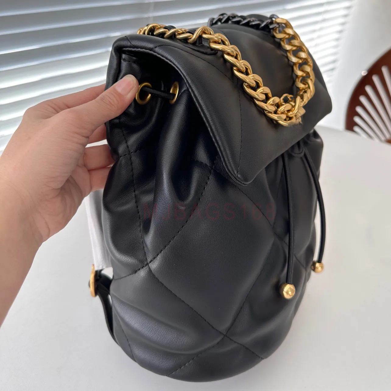 Gold chain backpack hot sale