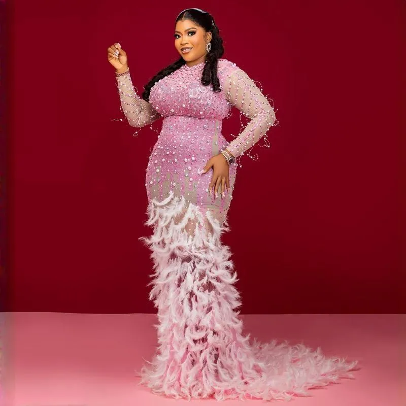 Arabic Aso Ebi Light Pink Prom Feather Illusion Beaded Sheer Neck Evening Formal Party Reception Gown from Dhgate Prom Dresses - price 867.46 Arabic Aso Ebi Light Pink Prom Feather Illusion Beaded Sheer Neck Evening Formal Party Reception Gown from Dhgate Prom Dresses - price 867.46