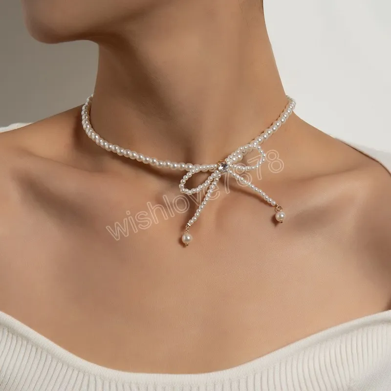 DHgate.com:Pearl Zircon Bowknot Choker Necklace: Elegant