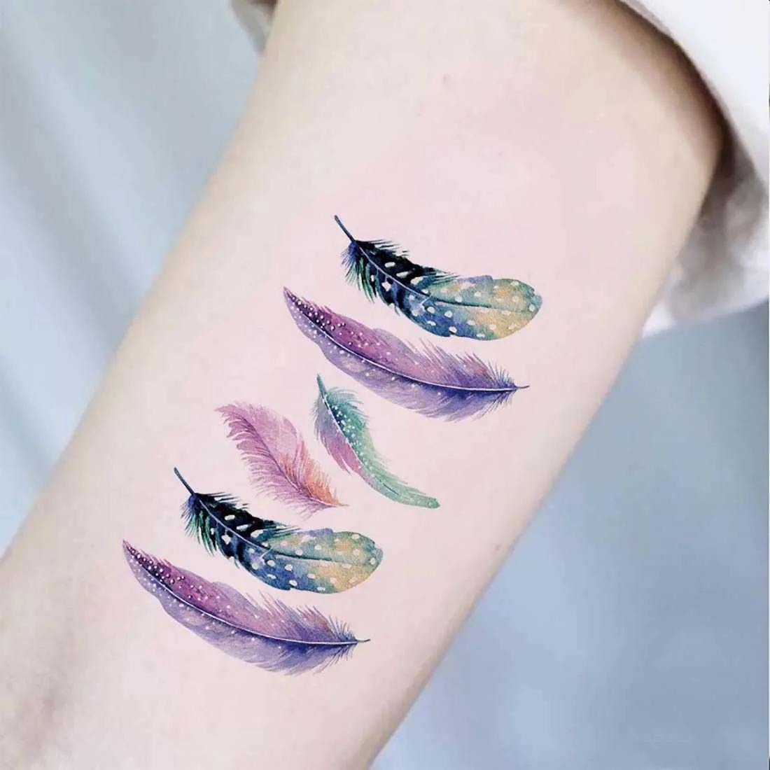 65+ Awesome Feather Tattoo Ideas & Meanings [You'll Love Them] — InkMatch