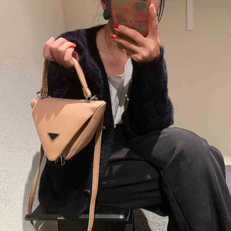 Новая сумка Prada Triangle: уникальный тренд для треугольного стиля [Мода moda]