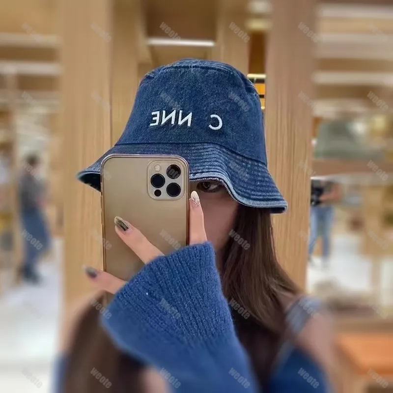 帽子 GANNI Fisherman Bucket Hat Denim Ganni Fisherman Bucket Hat in Bleached Denim | REVOLVE