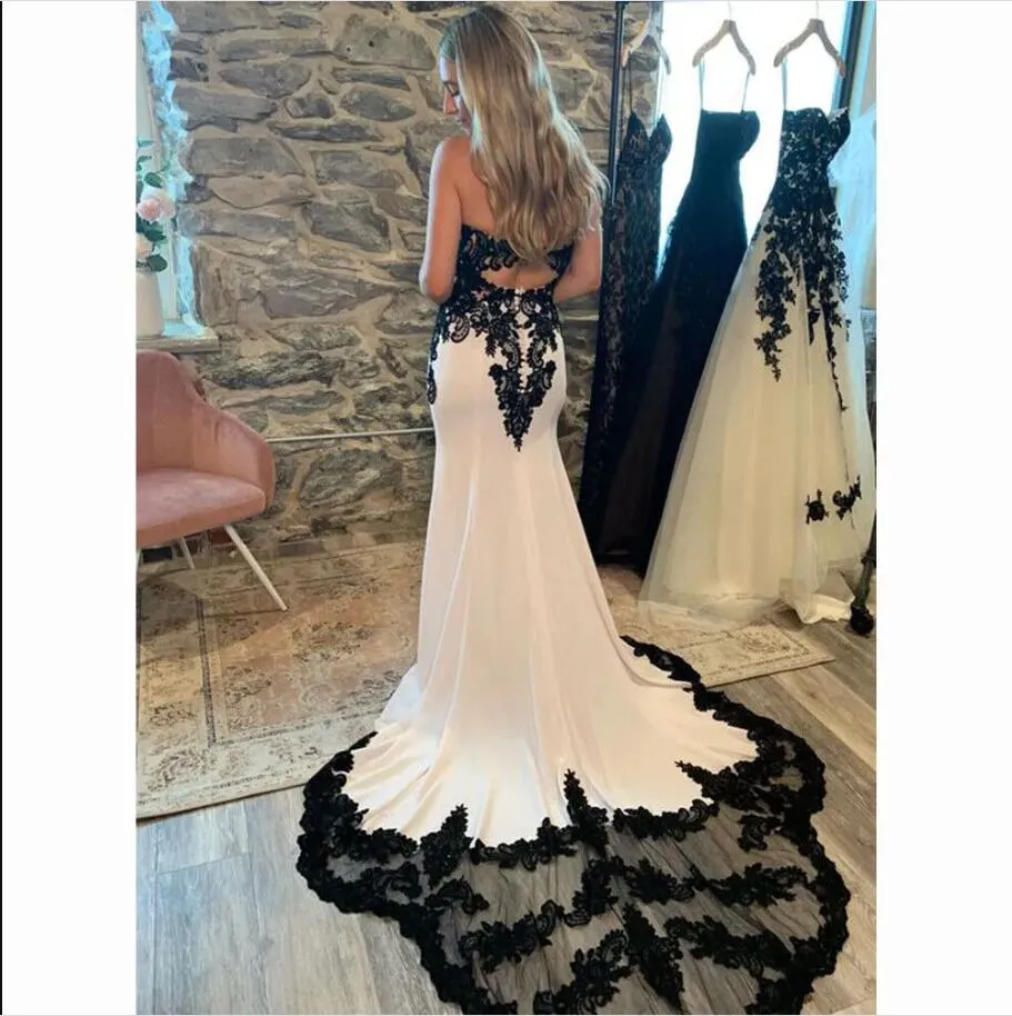 Bohemian Lace Applique Mermaid Black tie wedding dresses - Vintage Spaghetti Straps, Backless Design for Beach or Garden Bridal Gowns Bohemian Lace Applique Mermaid Black tie wedding dresses - Vintage Spaghetti Straps, Backless Design for Beach or Garden Bridal Gowns