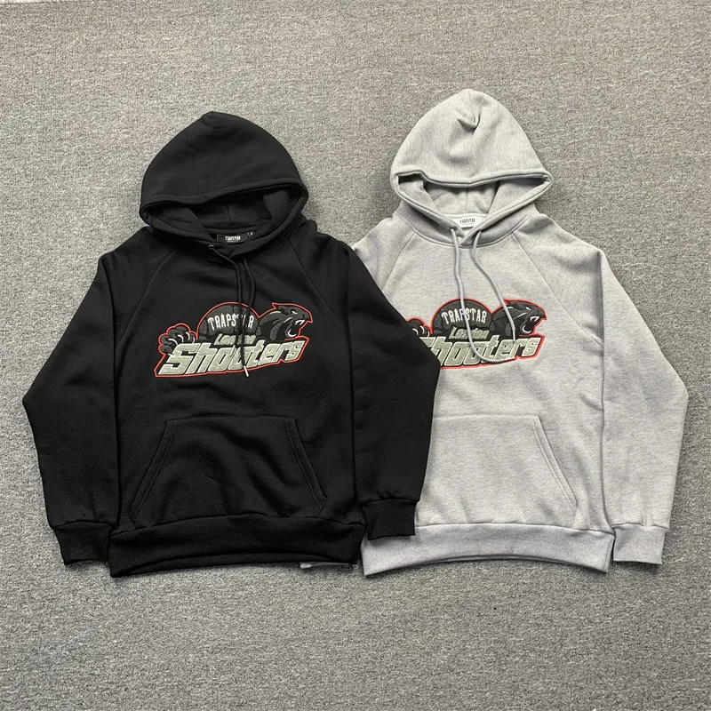 Black and best sale red trapstar tracksuit
