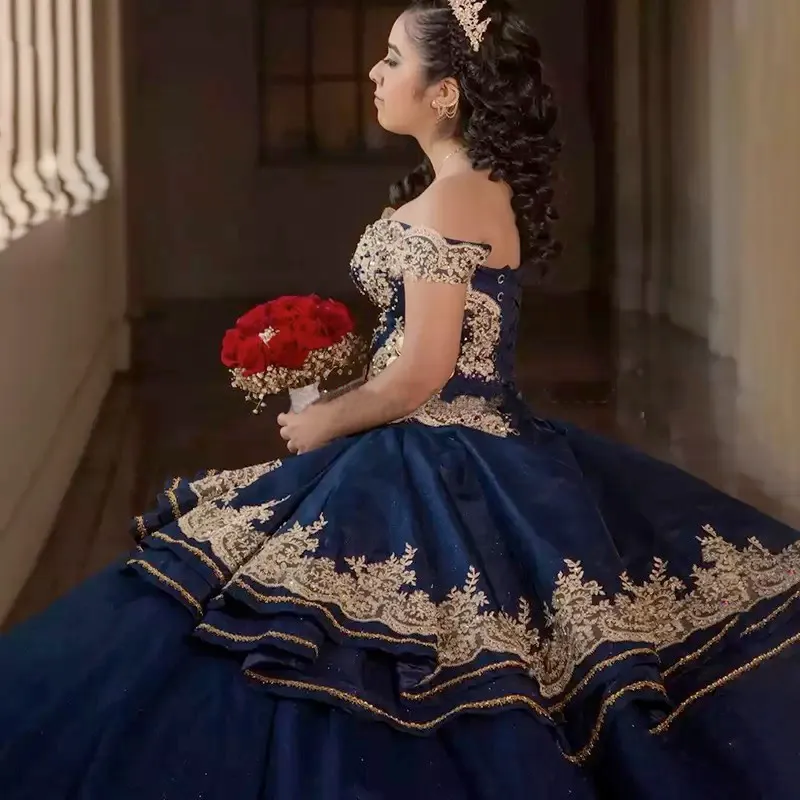 Navy blue and gold formal dress 2025