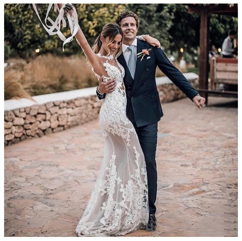 White Lace Applique Mermaid Boho Lace Wedding Dress with Illusion Sweetheart Neckline, Long Sleeves, and Open Back - Perfect for Formal Occasions White Lace Applique Mermaid Boho Lace Wedding Dress with Illusion Sweetheart Neckline, Long Sleeves, and Open Back - Perfect for Formal Occasions