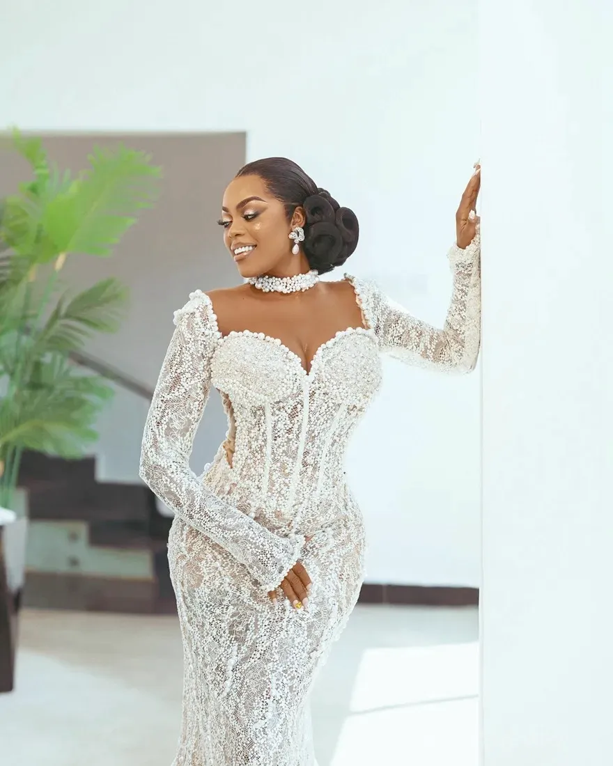 Stunning 24-Piece African Mermaid curvy wedding dresses with Illusion High Neck, Long Sleeves, Beaded Lace, and Pearls for Nigerian Brides - Perfect Stunning 24-Piece African Mermaid curvy wedding dresses with Illusion High Neck, Long Sleeves, Beaded Lace, and Pearls for Nigerian Brides - Perfect