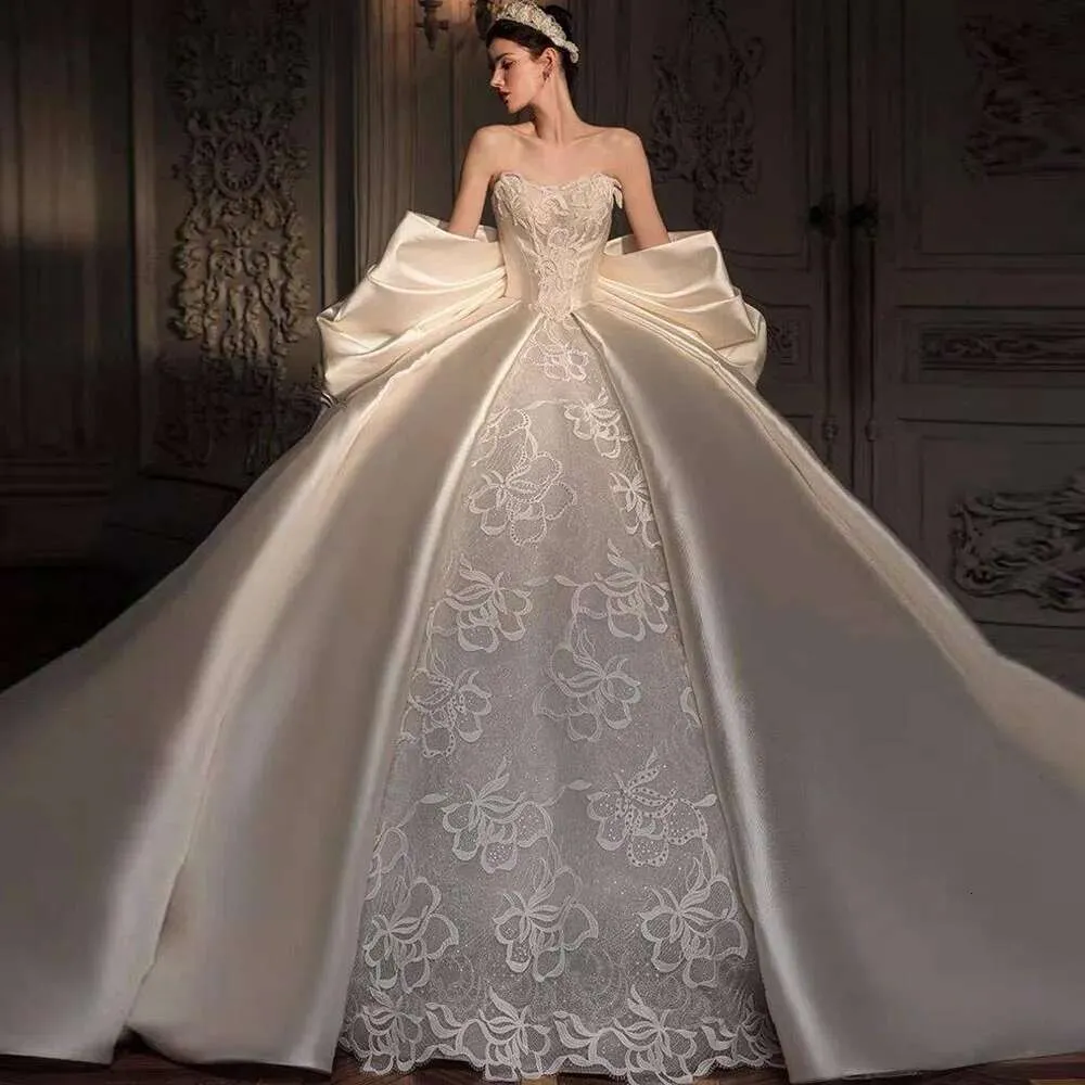 large satin bow for wedding dress Exquisite Satin wedding dress puffy sleeves with Large Bow, Sweet Neckline, Hochitless Beading Appliques