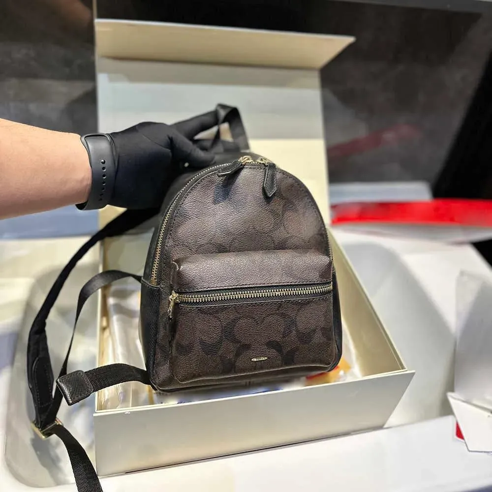 designer black leather backpack silver zippers FR Fashion Co. 13" Men's Crocodile Design Designed to age beautifully over time Retro Tassel PU Backpack
