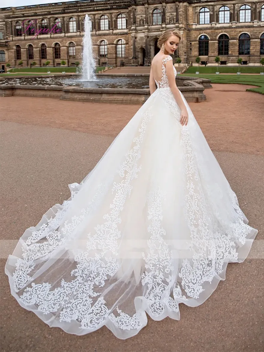 Sheer Cap Sleeve Lace A Line Wedding Dress Mesh Top... From Verycute, $82.74 | DHgate.Com Sheer Cap Sleeve Lace A Line Wedding Dress Mesh Top... From Verycute, $82.74 | DHgate.Com